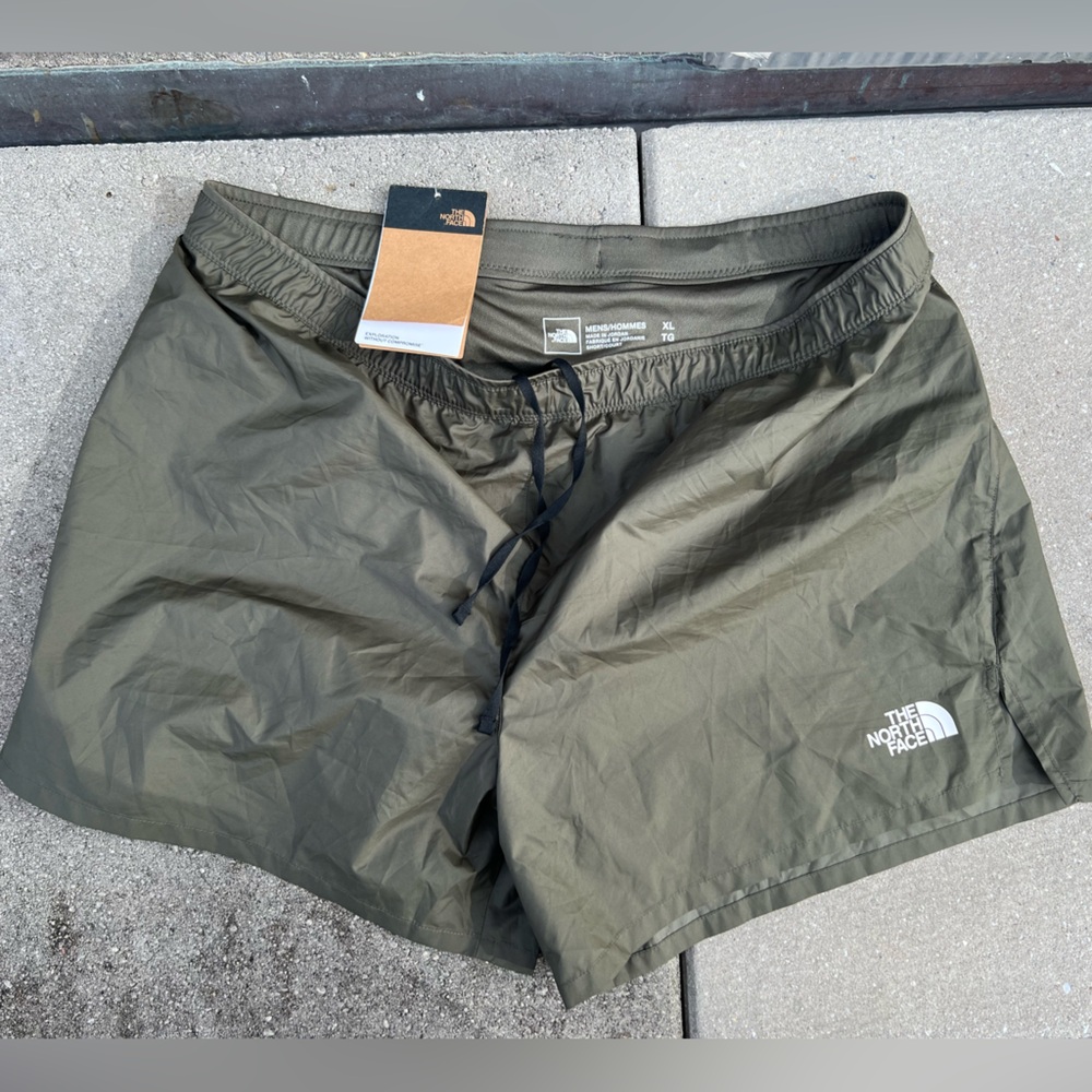 North face green running shorts